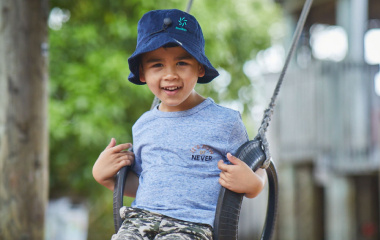 Kid on swing